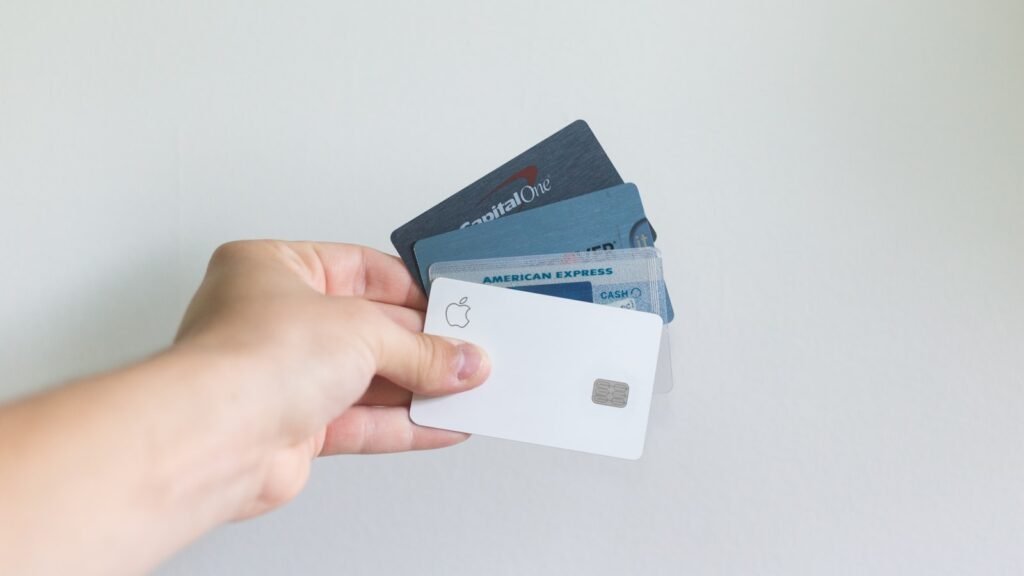 Person reviewing credit report and financial documents